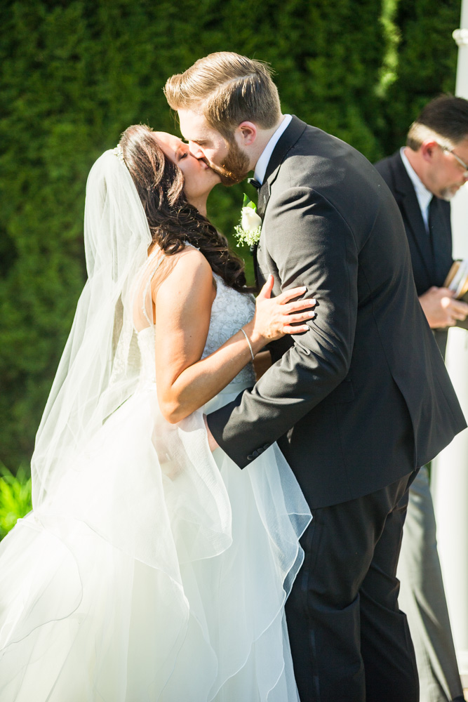 first kiss at a spring New England wedding