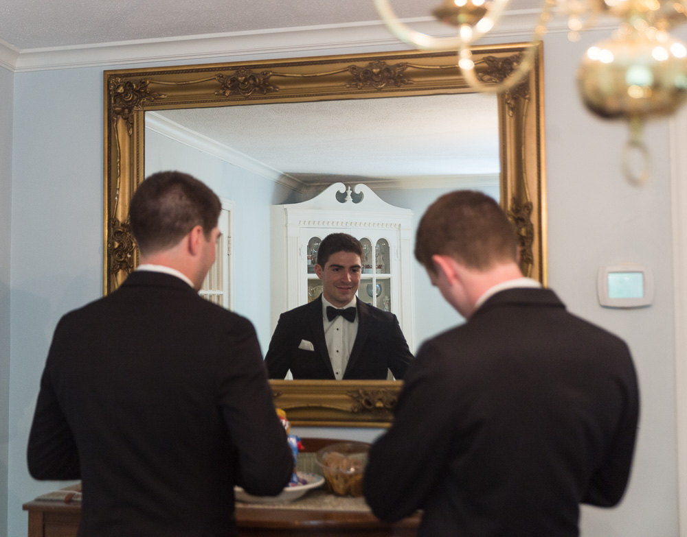 Groom getting ready for his wedding at the Delamar Hotel