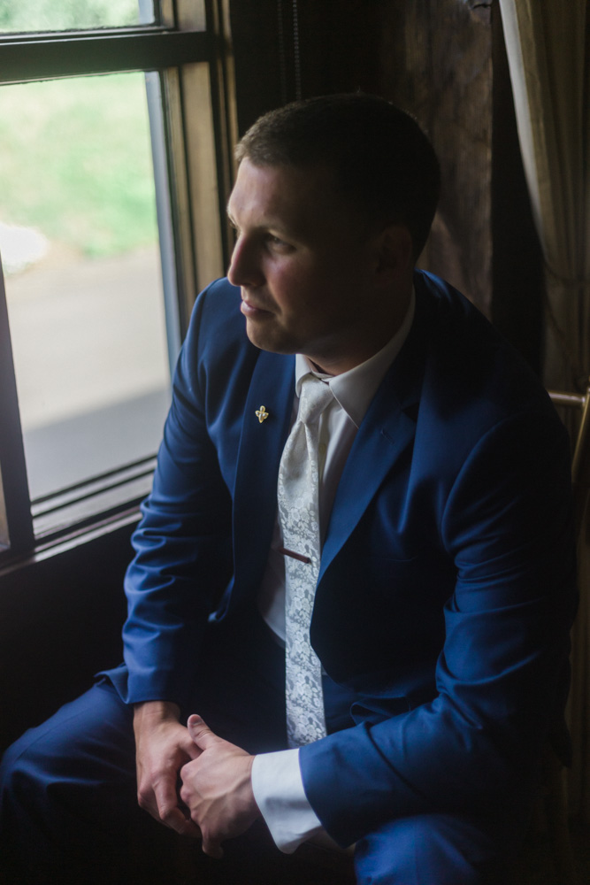 groom portrait at the tunxis country club
