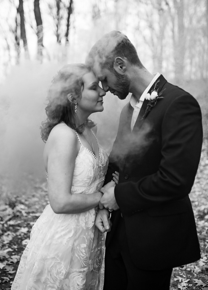 bride and groom portrait at Gillette castle with smoke bomb