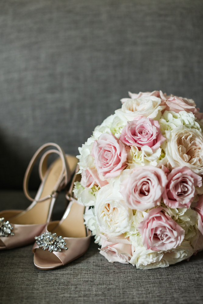Brides shoes and flowers for her  new haven wedding 