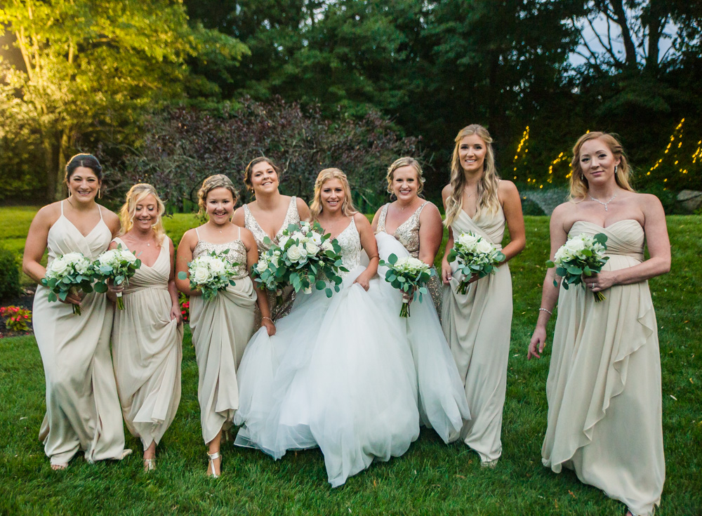 bride and bridesmaids at her woodwinds connecticut wedding