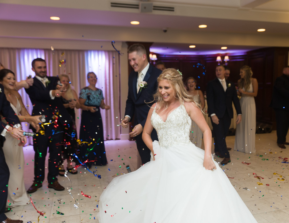 couple entering reception at   woodwinds connecticut wedding