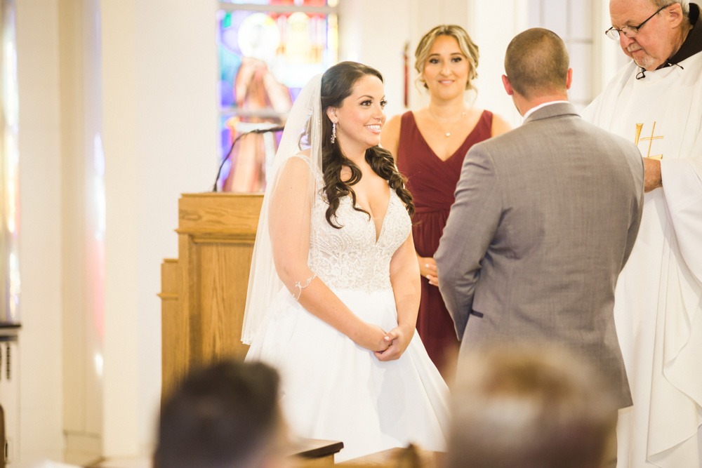 bride at her ceremony for her Saint clements wedding 