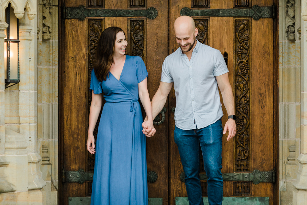couple laughing at their yale engagement session