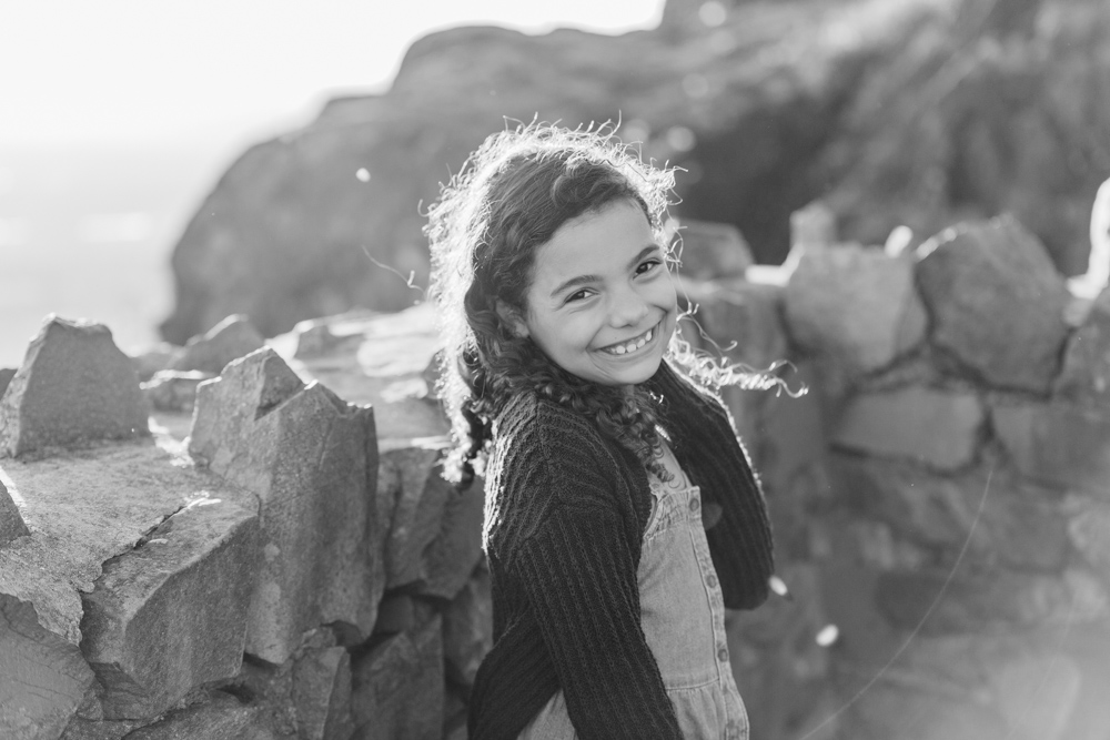 girl smiling for her hubbard park family session