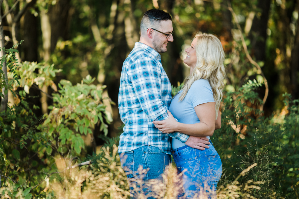 couple smiling at their wethersfield cove engagement session