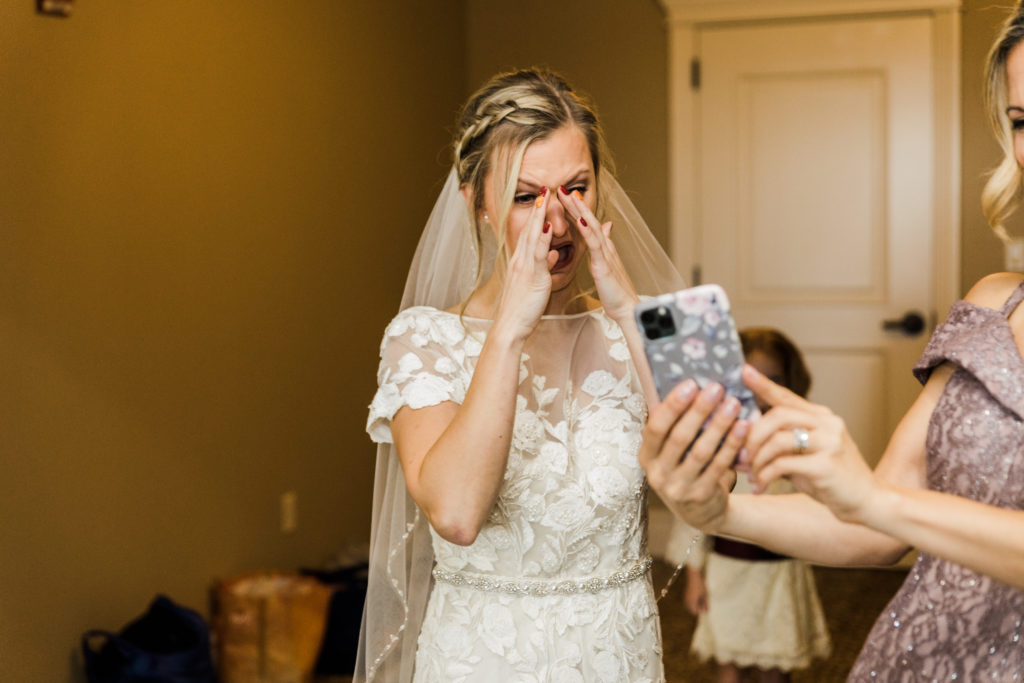 Bride having a Facetime with her family that couldnt make it to her aria fall wedding