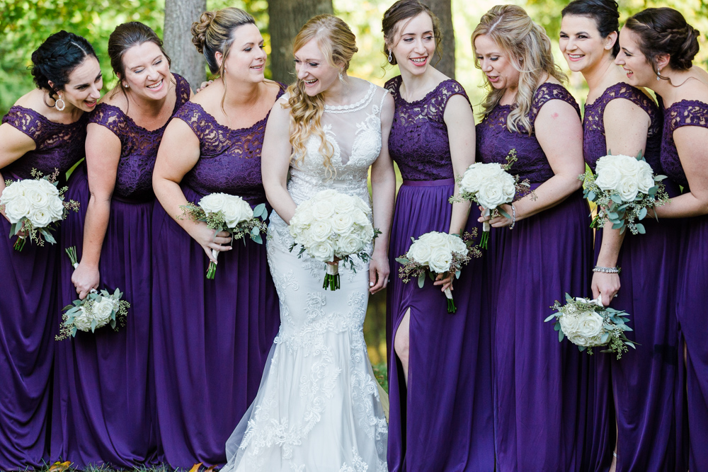 New England photographer's photo of a bride and her bridesmaids at her Riverview wedding