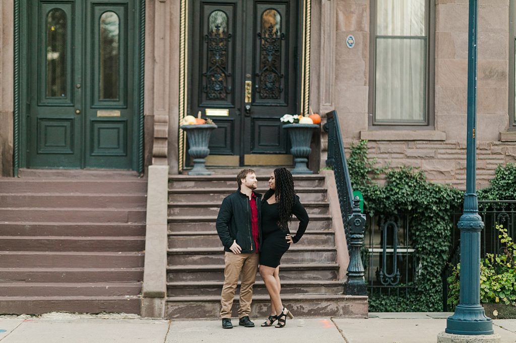 A couple at the brownstones for their downtown Hartford engagement session