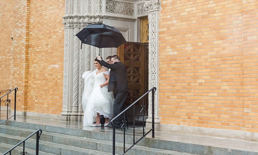 rainy wedding day church photo