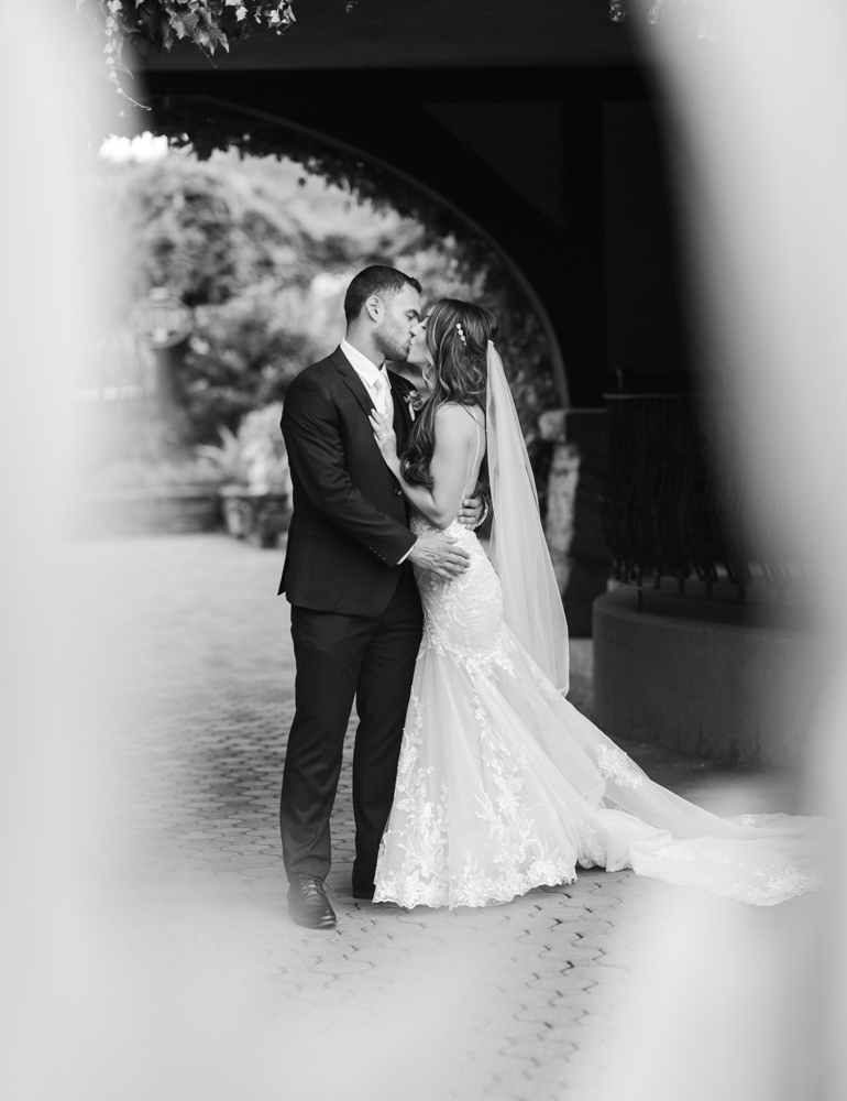 Black and white portrait of a bride and groom at their saint clements summer wedding