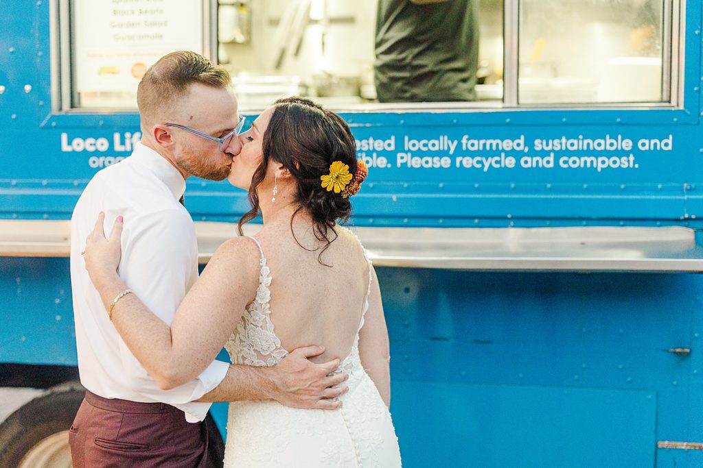 couple at taco truck at their Nuzzo's Farm wedding